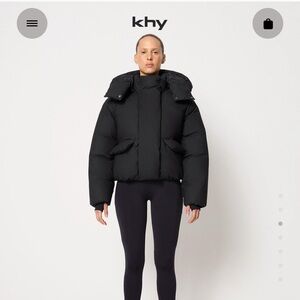 Kylie Jenner cropped black puffer jacket